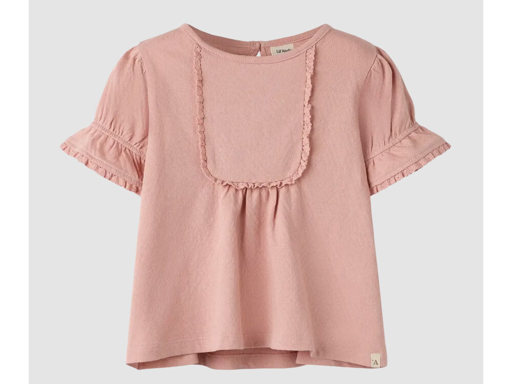 ROSE TAN