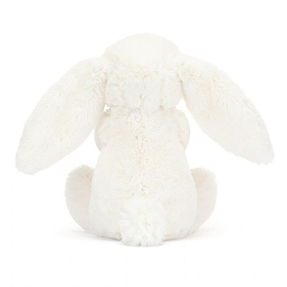 Peluche lapin blanc avec carotte +/- 34 cm